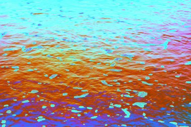 Neon renkli kum ve zemin dokusu canlı ve soyut bir yüzey oluşturuyor. Arkaplan, poster, web tasarımı, reklam ve yaratıcı sanat eserleri için uygun yüksek çözünürlüklü dijital doku.