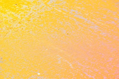 Sıcak tonlar ve desenli tahıl etkisine sahip soyut renkli arkaplan. Modern tasarım, markalaşma, posterler, dijital sanat eserleri, duvar kağıtları, sunumlar ve yaratıcı görsel kompozisyonlar için canlı sanatsal arkaplan ideali.