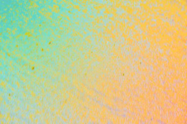 Sıcak tonlar ve desenli tahıl etkisine sahip soyut renkli arkaplan. Modern tasarım, markalaşma, posterler, dijital sanat eserleri, duvar kağıtları, sunumlar ve yaratıcı görsel kompozisyonlar için canlı sanatsal arkaplan ideali.