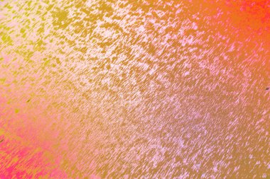 Sıcak tonlar ve desenli tahıl etkisine sahip soyut renkli arkaplan. Modern tasarım, markalaşma, posterler, dijital sanat eserleri, duvar kağıtları, sunumlar ve yaratıcı görsel kompozisyonlar için canlı sanatsal arkaplan ideali.