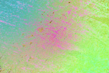 Boyalı deseni ve yumuşak tahıl detayı olan soyut renkli bir arkaplan. Modern tasarım, markalaşma, posterler, dijital sanat, duvar kağıtları, sunumlar ve yaratıcı görsel kullanım için uygun çok renkli arkaplan.