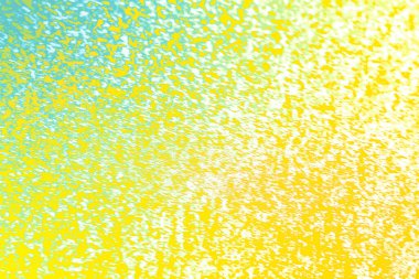 Renkli eğimli soyut kum arka planı ve ışık ve doğal yüzeylerle şekillenen dağınık tahıl desenleri. Yumuşak geçişleri olan canlı organik dokular, modern tasarım, yaratıcı yerleşimler ve sanatsal görsel kavramlar için ideal..