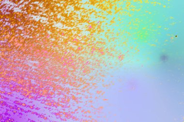 Renkli eğimli soyut kum arka planı ve ışık ve doğal yüzeylerle şekillenen dağınık tahıl desenleri. Yumuşak geçişleri olan canlı organik dokular, modern tasarım, yaratıcı yerleşimler ve sanatsal görsel kavramlar için ideal..