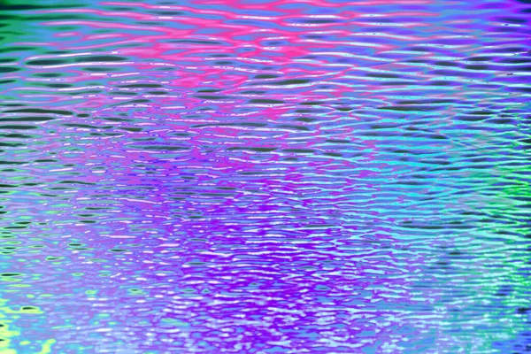 Parlak renkli cam yüzeyin soyut doku arkaplanı