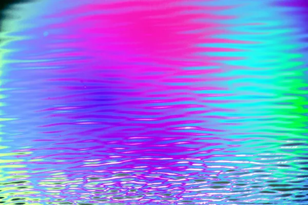 Su dalgaları ve yansıması olan soyut arkaplan