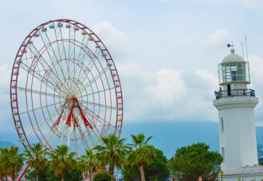 Lighthouse and Ferris wheel in city Batumi, Georgia