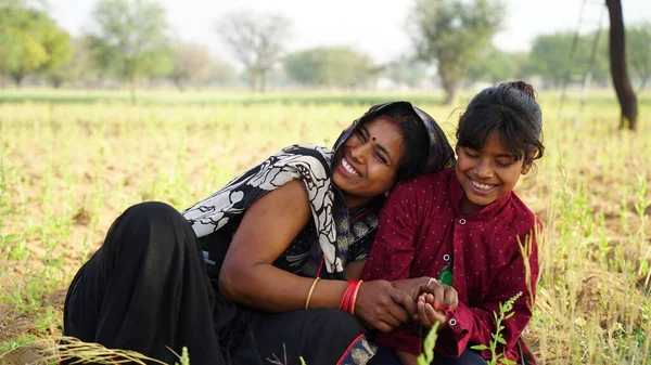 Front shot of Asian family members giving pose with each other. Beautiful family shot closeup with attractive smiley expression.