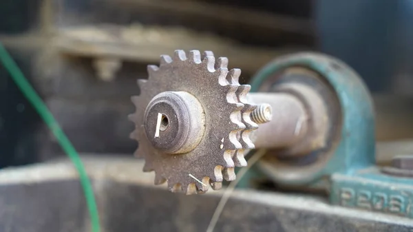 Metal unique gears with sharpened teeth. Metal gear box closeup.