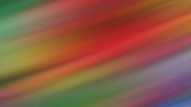 Çapraz kırmızı, turuncu, sarı ve yeşil çizgiler soyut dokulu bir arkaplan oluşturur.