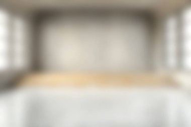 Bu resim, ahşap zemin, beton duvarlar ve yumuşak doğal ışıklandırmadan oluşan parlak, minimalist bir iç mekan sergiliyor, sakin ve davetkar bir atmosfer yaratıyor..