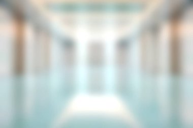 Yumuşak odak noktasında çekilen sakin ve soyut bir iç mekan, pürüzsüz yüzeylerde ışık yansımaları sergiliyor, sakin bir atmosfer yaratıyor.