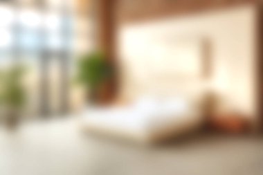 Bu resim, rahat bir yatağı ve parlak, davetkar bir atmosferi olan modern bir yatak odasını çekiyor. Ev dekorasyonu ilhamı için ideal.