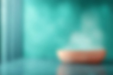 Bu büyüleyici soyut arkaplan, turkuaz ve turuncu yumuşak dokular içerir, modern tasarımlar veya sanatsal projeler için mükemmel sakinleştirici bir atmosfer yaratır..