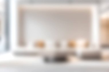 Rahat koltukları ve sıcak doğal ışığı olan sakin, modern bir yaşam alanı. Rahatlamak için ideal. Bu iç tasarım konfor odaklı minimalist estetiği sergiliyor.