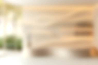 Yumuşak ışıklandırma, ahşap bir duvar ve yemyeşil bitkiler içeren şık, minimalist bir iç mekan. Rahatlamak için davetkar ve sakin bir atmosfer yaratıyor..