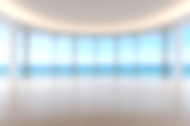 Mavi okyanus manzarası sunan geniş pencereli parlak ve modern bir iç mekan. Rahatlama ve sükunet için ideal..