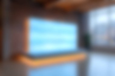 Minimalist iç tasarım elementleri tarafından tamamlanan soyut mavi ışık gösterimine sahip modern, parlak bir oda, sakin ve şık bir atmosfer yaratıyor..