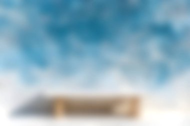 Zarif bir minimalist sehpa canlı mavi bir arka plana dayanır, doğal dokular ve yumuşak ışıklandırma sergiler. Modern iç tasarım için mükemmel..