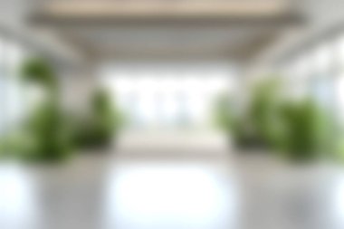 Bu görüntü, doğal ışığın dingin ve davetkar bir atmosfer yaratmasını sağlayan yemyeşil bitkilerle dolu modern bir iç mekan içeriyor. Tasarım ilhamı için ideal.