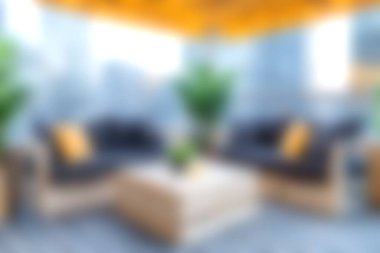 Rahat bir oturma odası, şık bir dekor ve sıcak doğal ışık barındıran rahat bir modern salon. Rahatlama ve estetik zevk için ideal..