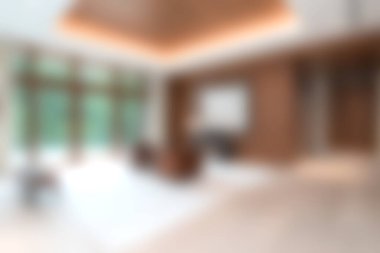 Bu resim, bol doğal ışık, mobilya ve rahatlama için mükemmel sakin bir atmosfere sahip zarif bir tasarıma sahip modern bir oturma odasını gösteriyor..