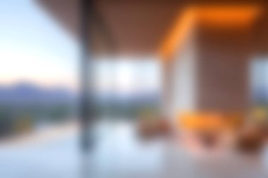 Bu resim, modern bir oturma odasını geniş görüşlü, doğal ışık dolu huzurlu bir atmosfer sunan çarpıcı bir açık konsept tasarımı görüntülüyor..