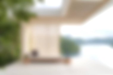 Bu resim, doğal ışık, ahşap aksanlar ve rahatlama için mükemmel barışçıl bir atmosfere sahip modern minimalist tarzda tasarlanmış sakin bir açık hava alanı gösteriyor..