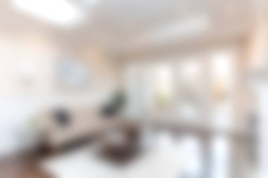 Rahat bir kanepe, bol doğal ışık ve gösterişli dekorların olduğu parlak ve modern bir oturma odası. Çağdaş yaşam tarzını göstermek için ideal.