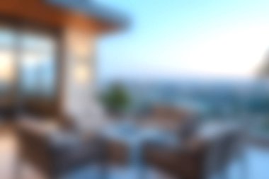 Gün batımında çarpıcı şehir manzaralı sakin bir açık hava oturma alanının tadını çıkarın. Rahatlama ve sosyal toplantılar için mükemmel. Bu alan konfor ve stili birleştirir..