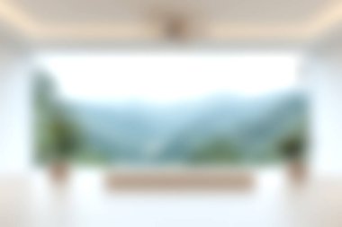 Geniş pencerelerden nefes kesici bir dağ manzarası gösteren sakin ve ferah bir iç mekan, doğada huzur ve rahatlama duygusunu teşvik ediyor..