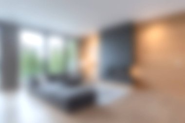 Modern estetik, yumuşak ışıklandırma ve rahat bir atmosfer sunan güzel tasarlanmış bir oturma odası. Ev dekorasyonu için ilham arayanlar için ideal.