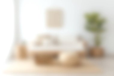 Samimi minimalist bir oturma odasında doğal elementler ve parlak güneş ışığı sergilenerek sıcaklık ve rahatlıkla dolu davetkar bir atmosfer yaratılıyor..