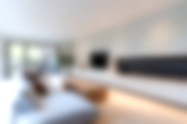 Rahat bir kanepe, şık bir dekor ve doğal bir ışık barındıran modern bir oturma odası rahatlama ve aile toplantıları için mükemmel bir ortam yaratıyor..