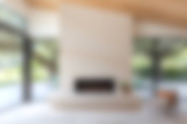 Huzurlu ve cezbedici modern bir oturma odası. Minimalist bir tasarımı, rahat bir şöminesi ve bol doğal ışığı var. Rahatlamak ve rahatlamak için mükemmel..