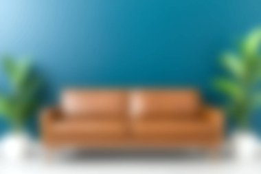 Bu resimde, yemyeşil bitkilerle tamamlanmış canlı mavi bir duvara dayalı modern bir deri kanepe yer alıyor. İç tasarım elementlerini göstermek için ideal.