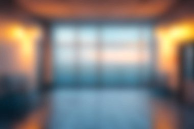 Yumuşak ve bulanık bir iç görünüş modern bir şehir alanını sergiliyor. Sıcak günbatımı ışığında yıkanmış. Huzuru ve çağdaş tasarımı iletmek için ideal.