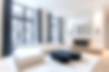 Bu görüntü, rahat mobilyaların ve doğal ışığı davet eden büyük pencerelerin yer aldığı parlak ve modern bir oturma odası yakalıyor. Tasarım rahatlamayı ve rahatlığı teşvik eder..