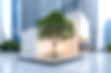 Çarpıcı bir modern mimari tasarım, çarpıcı bir şehir manzarasında doğa ve kentsel çevrelerin harmanlandığı öne çıkan bir ağacı olan minimalist bir bina sergiliyor..