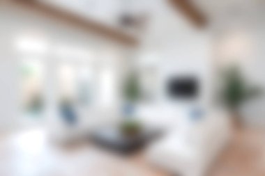 Bu resim modern tasarım elementlerinin yer aldığı parlak ve ferah bir oturma odasını gösteriyor. Doğal ışık bölgeyi dolduruyor, rahatlamayı ve rahatlığı davet eden rahat atmosferi güçlendiriyor..