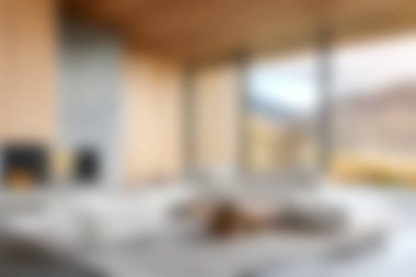 Ilık doğal ışıklandırma, rahat tekstil ve zarif ahşap elementlerin yer aldığı güzel tasarlanmış minimalist bir iç mekan. Modern yaşam için ideal..