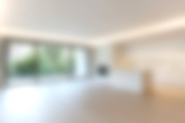 Parlak ve havadar minimalist bir yaşam alanı. Geniş pencerelerden içeri ışık saçıyor. Rahatlamak için mükemmel bir ortam yaratıyor..