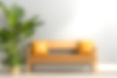 İçinde yastıklar ve dekoratif bir bitki bulunan modern bir kanepenin olduğu şık bir oturma odası sahnesi. Yumuşak doğal ışık davetkar ve sakin bir atmosfer yaratır..