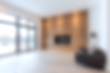 Çarpıcı bir modern oturma odası. Minimalist iç tasarım, parlak ışıklandırma ve rahat koltuklar, rahatlama ve şık toplantılar için mükemmel..