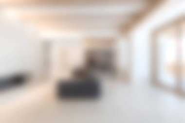 Geniş pencereleri, minimalist mobilyaları ve rahat bir havası olan modern mimarinin sergilendiği sakin bir oturma odası. Mekan doğal ışık ve zarif dekorlarla dolu..