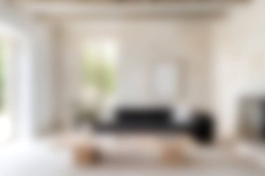 Bu zarif oturma odasında siyah bir kanepe, doğal bir ışık ve minimalist bir dekor var. Rahatlama ve tarz için mükemmel bir ortam yaratıyor..