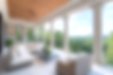 Bu resim, doğal ışık ve nefes kesici açık hava manzaralarını davet eden geniş pencereli samimi ve modern bir oturma odasını gösteriyor. Huzurlu ve davetkar bir ortam yaratıyor. Rahatlamak için mükemmel..