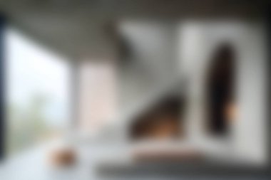 Doğal ışık, açık alanlar ve sakin bir ambiyansa katkıda bulunan zarif mimari detaylara sahip minimalist bir tasarıma sahip sakin ve şık bir modern iç mekan..