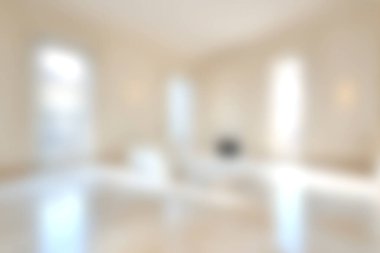 Bu parlak ve havadar oturma odasında yumuşak bir ışık, minimalist bir dekor ve rahatlama ve rahatlama için mükemmel bir davetkar atmosfer var..