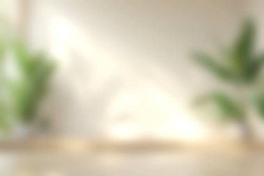 Yumuşak doğal ışığın yer aldığı sakin bir kapalı alan yemyeşil bitkilerle minimalist bir tasarımı aydınlatarak rahatlama ve ilham için mükemmel sakin bir atmosfer yaratıyor..