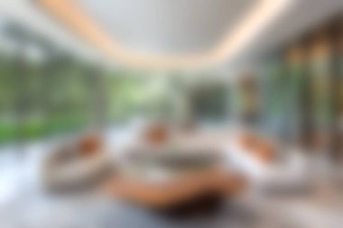 Doğal ışık, rahat mobilyalar ve dinlenme ve sosyal etkinlikler için sakin bir ortam sağlayan geniş pencereli şık ve modern bir oturma odası..